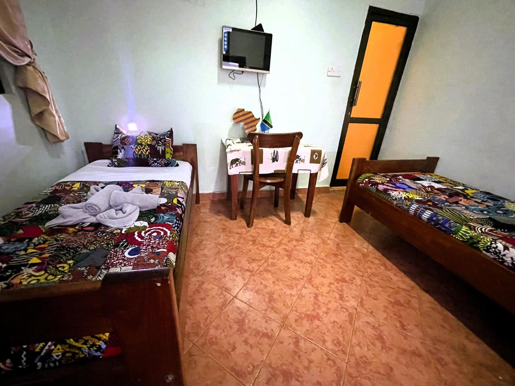 Home Feeling Neneu Lodge Moshi Dış mekan fotoğraf