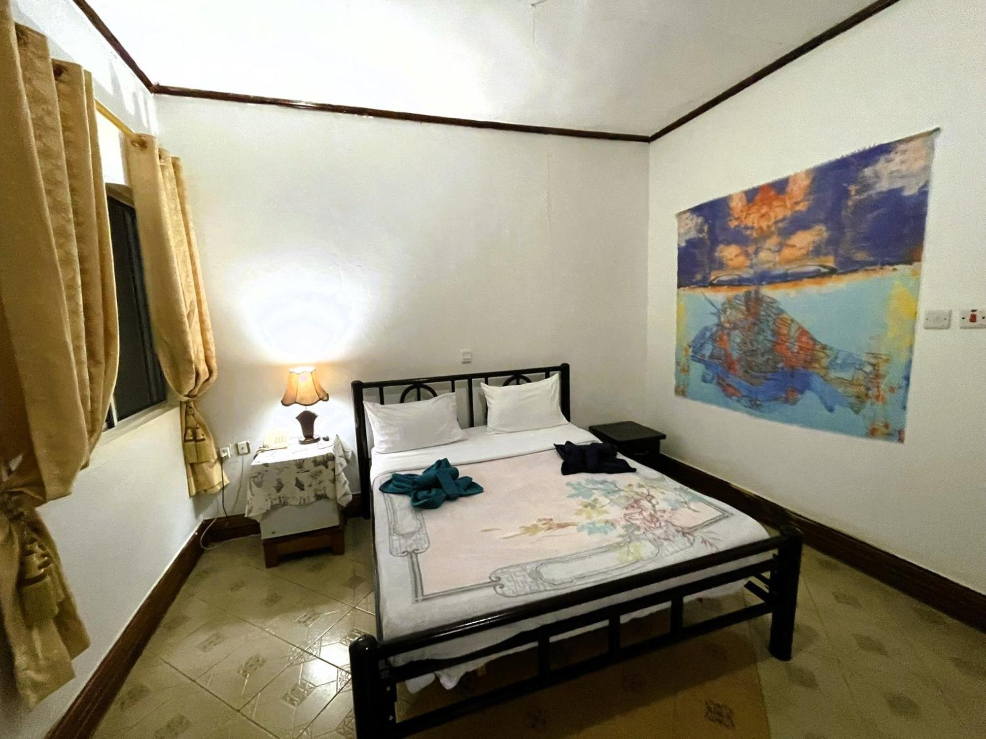 Home Feeling Neneu Lodge Moshi Dış mekan fotoğraf