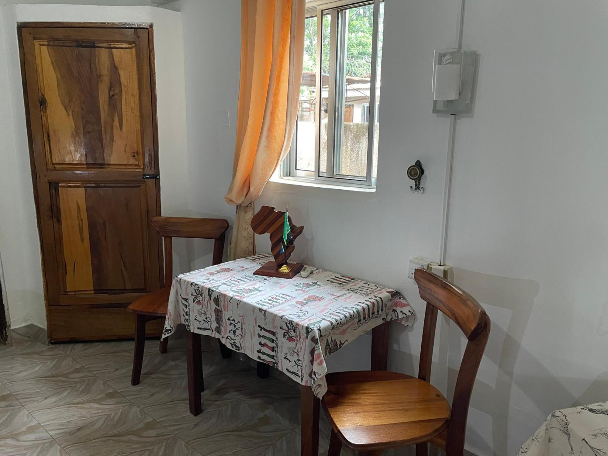 Home Feeling Neneu Lodge Moshi Dış mekan fotoğraf